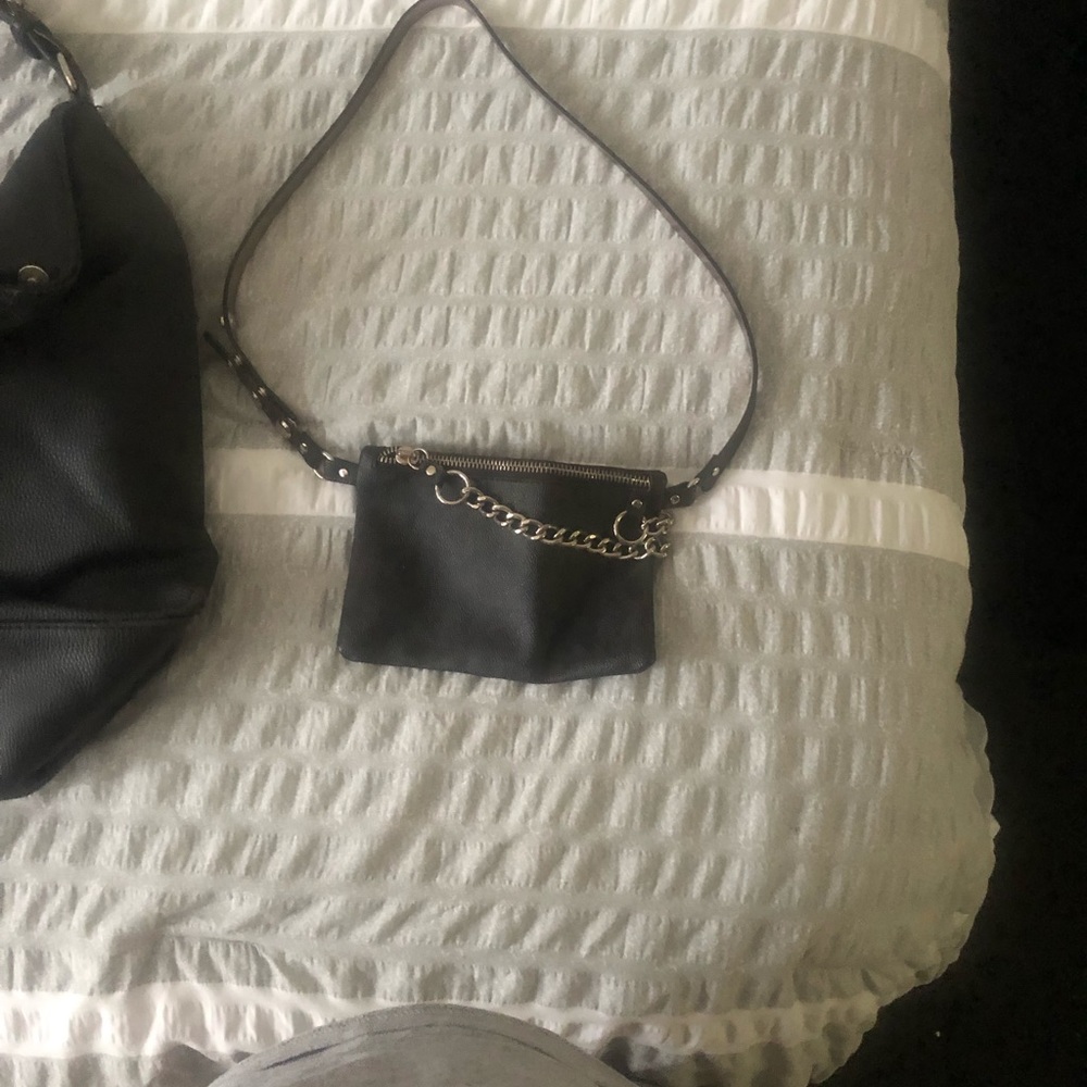 Purses hand bags and fannie packs